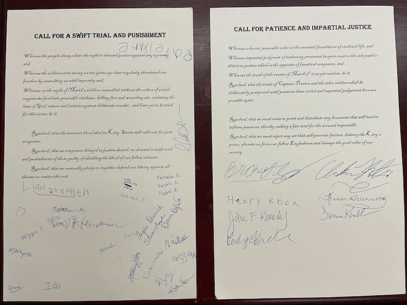 Picture of the resolutions at the Boston Massacre town hall. One resolution sheet is titled “call for a short trial and punishment” and the other is titled “call for patience and impartial justice.” “call for a short trial and punishment” has significantly more signatures below the resolutions