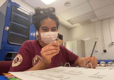 Alexa Wearing Mask Doing Conservation Work