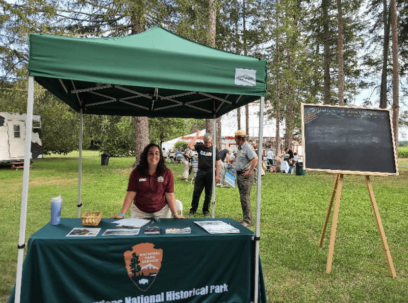 Engaging with visitors at an opera show taking place at Blow-Me-Down Farm