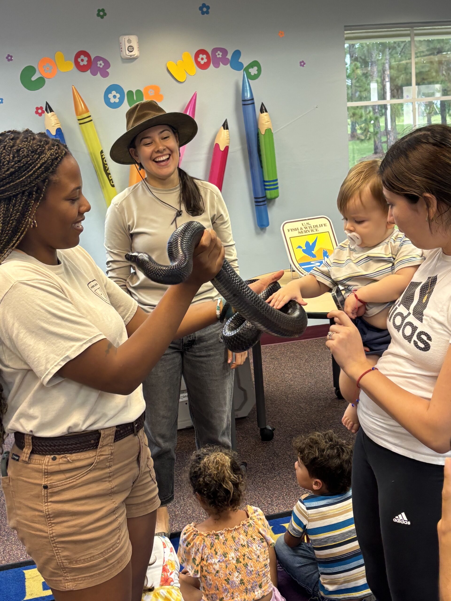 Tandria works with children in photo