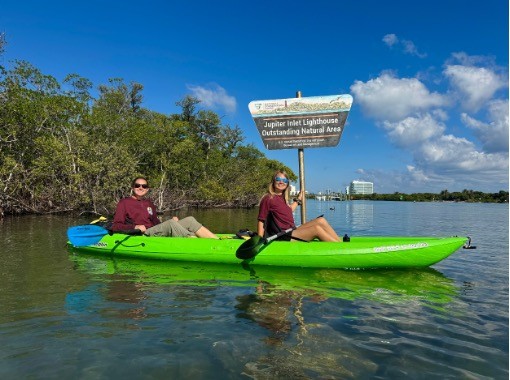 photo of two ACE people in a canoe