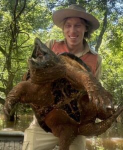 Myself with an alligator snapping turtle