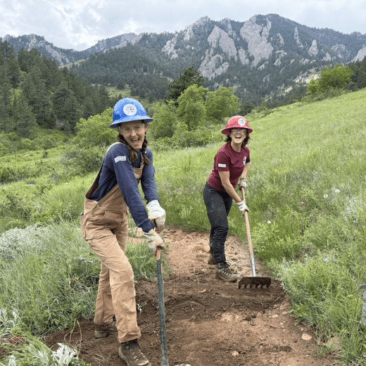 two ACE members working on trails
