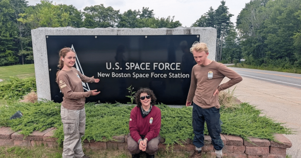 ACE crew members standing by Space Force sign