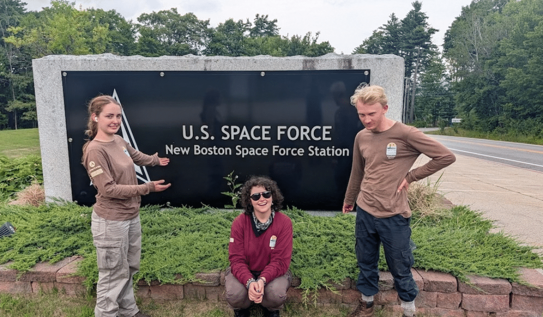 ACE crew members standing by Space Force sign