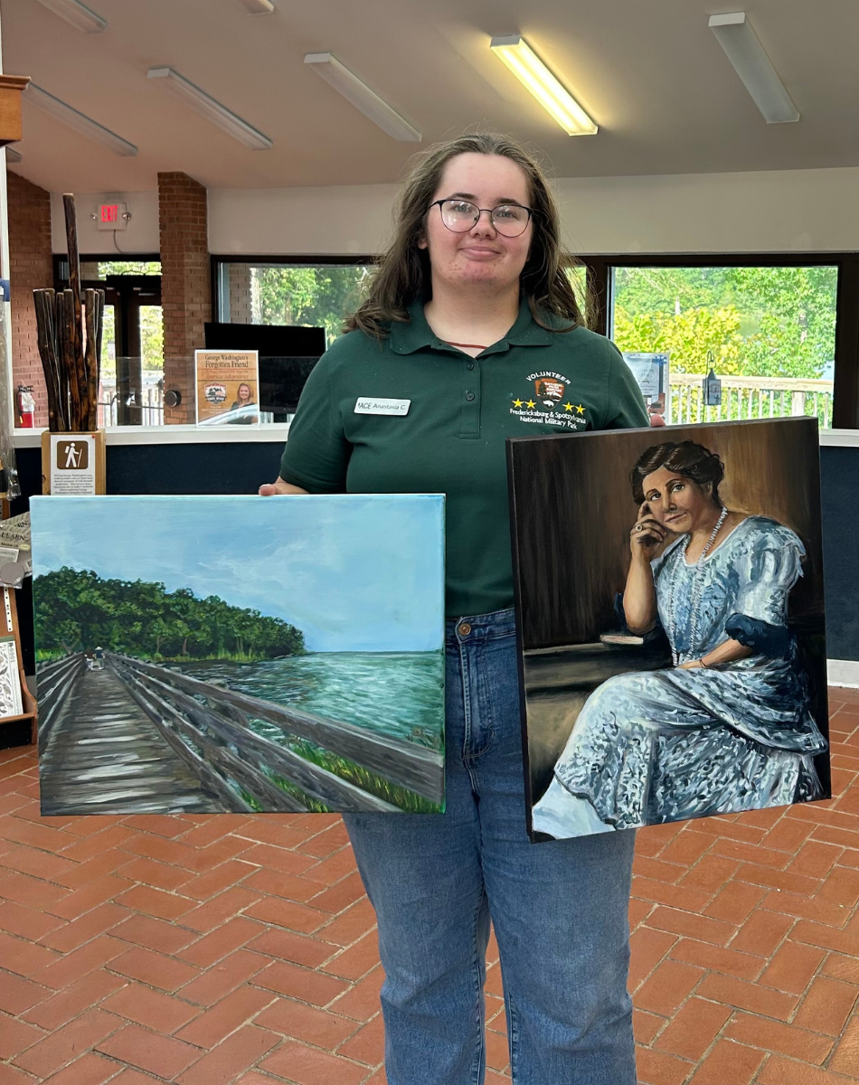 Anastasia Camarca with completed artwork Anastasia with completed artwork